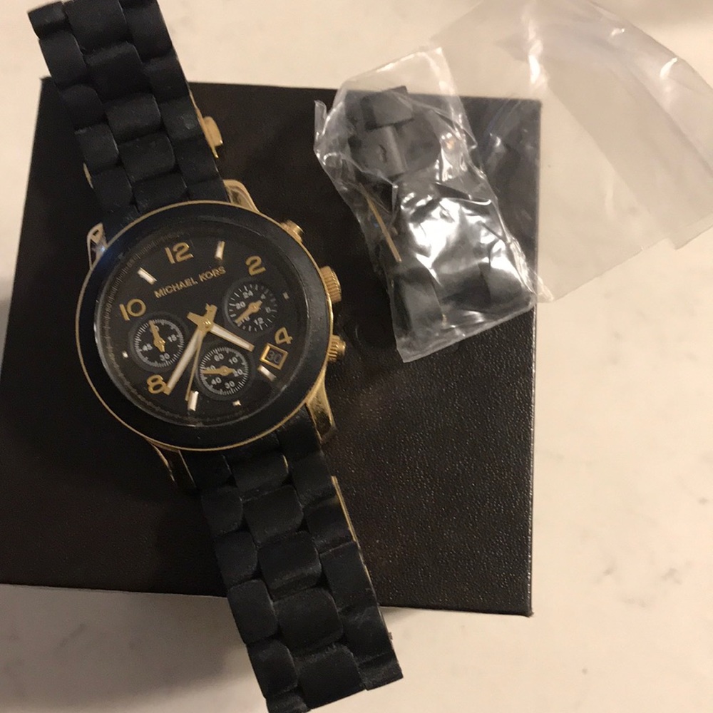 Michael Kors Black and gold plated women’s watch